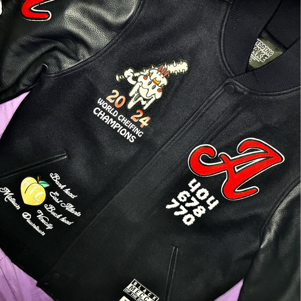 A new  Varsity Jacket, Size small and very trendy